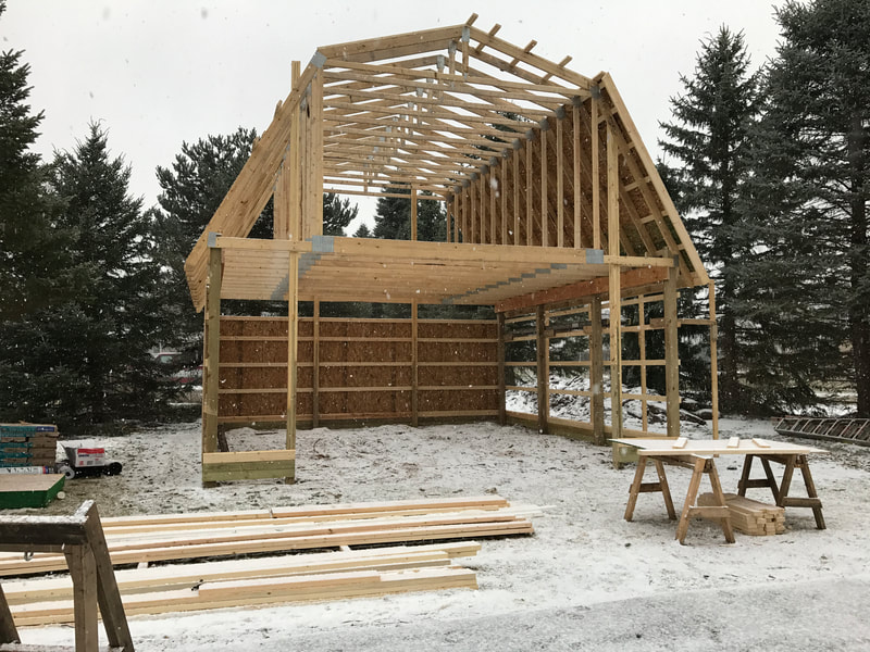 Step #2 of building a pole barn, frame it out.